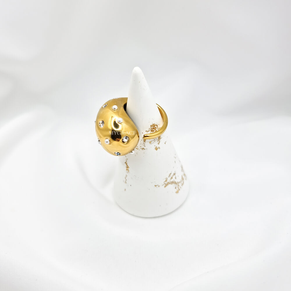 Stainless steel ring "Be stylish", teardrop design, stainless steel, 18K gold-plated and decorated with cubic zirconia and small pearls