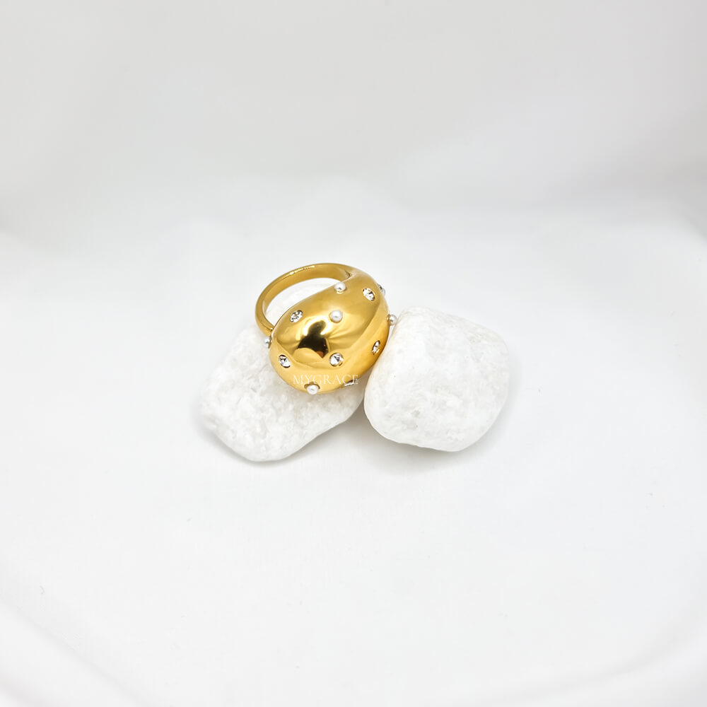 Stainless steel ring "Be stylish", teardrop design, stainless steel, 18K gold-plated and decorated with cubic zirconia and small pearls